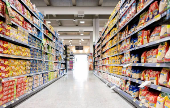 Supermarket aisle with assorted snacks