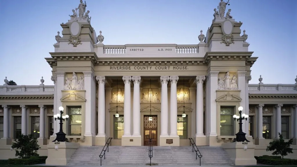 Elegant neoclassical building facade with lights