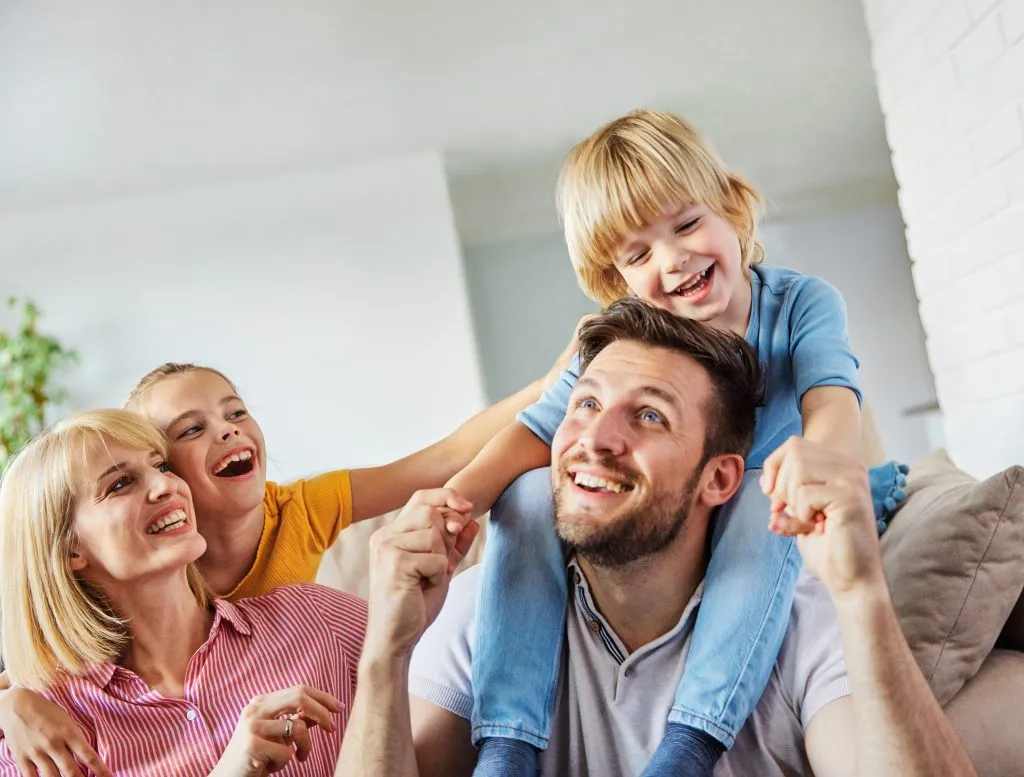 Happy family enjoying time together at home